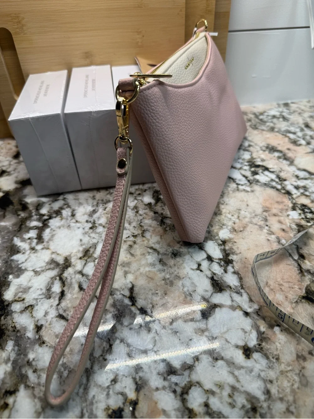 Nanette Lepore Pink and Cream Leather Wristlet with Removable Gold Cross Chain